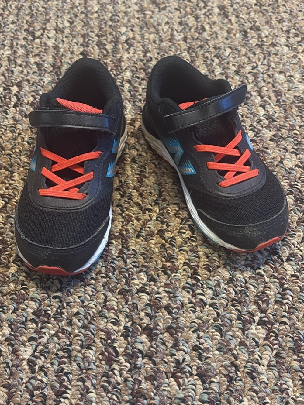 New Balance Toddler/Kids Black and Red Athletic Sneakers with Blue Accents
